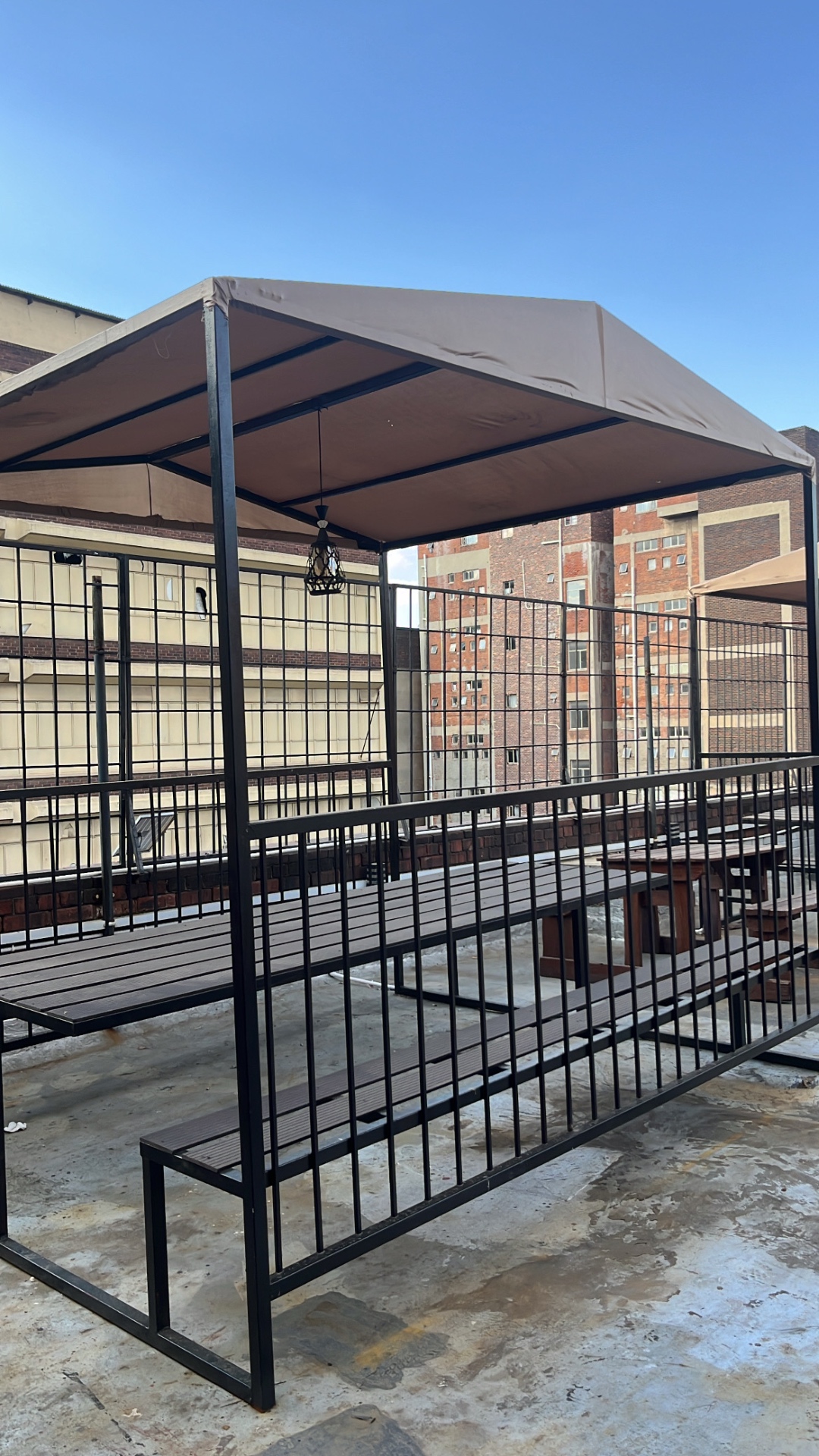 Rooftop seating with covered gazebo and benches